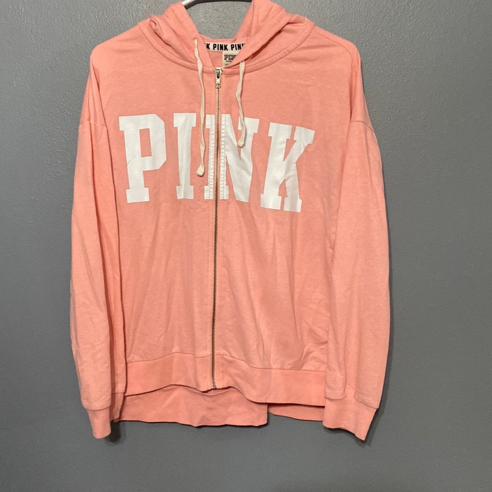 Size small PINK zip up sweatshirt.